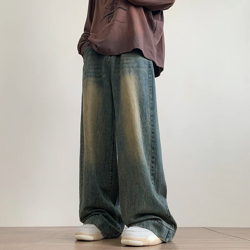 DISTRESSED-FADED DENIM JEANS